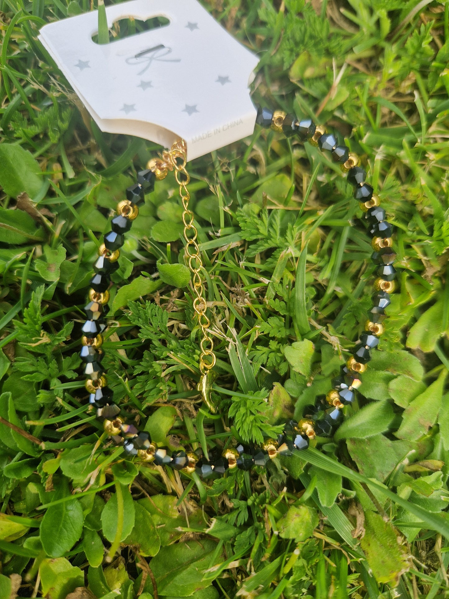 Handmade Black & Gold Beaded Bracelet with Golden Stainless Dolphin Lock