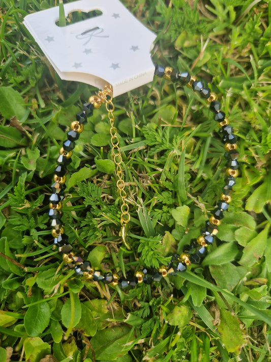 Handmade Black & Gold Beaded Bracelet with Golden Stainless Dolphin Lock